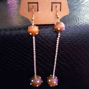 Pair of wooden and gold earrings
